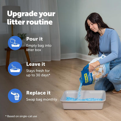 Cat using a litter box filled with PetSafe crystal litter