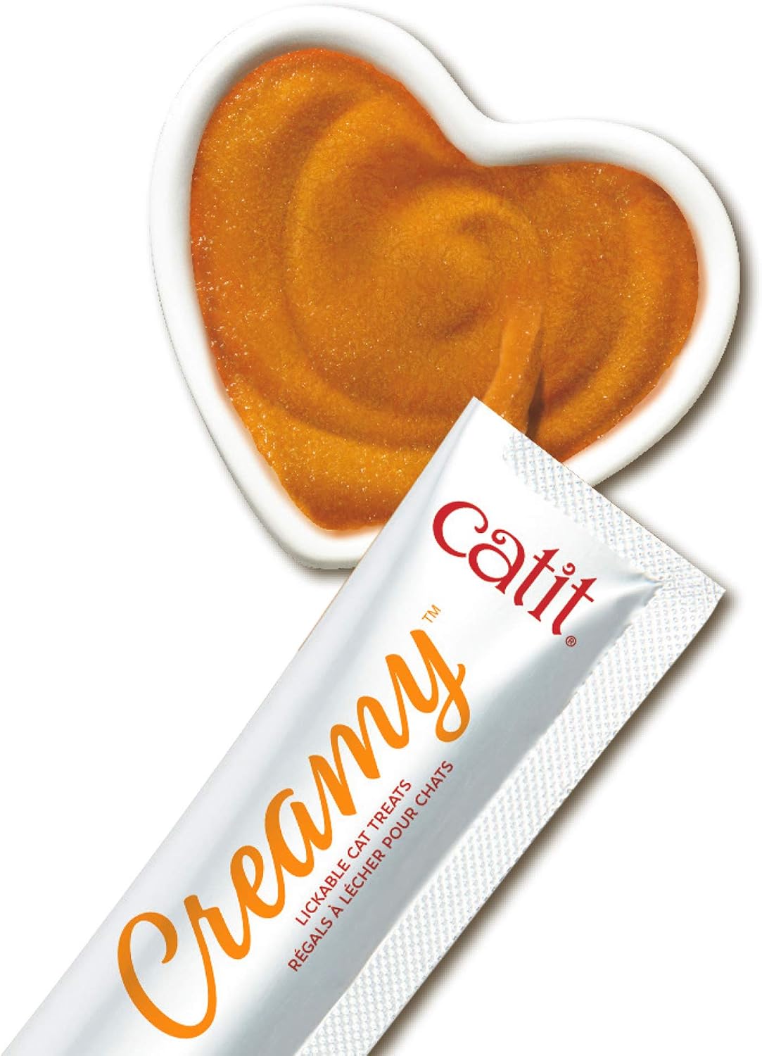 Healthy cat enjoying Catit Creamy lickable treat