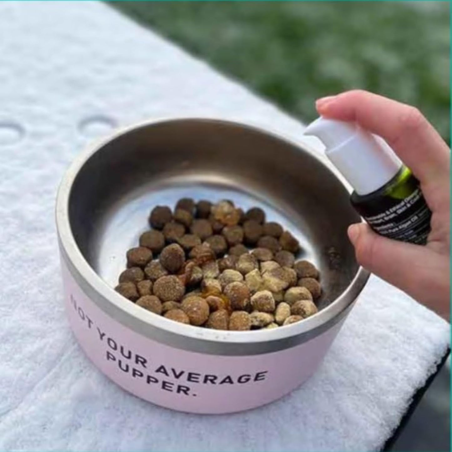 Dropper application view demonstrating how to easily measure the concentrated DHA and EPA liquid for cat food.