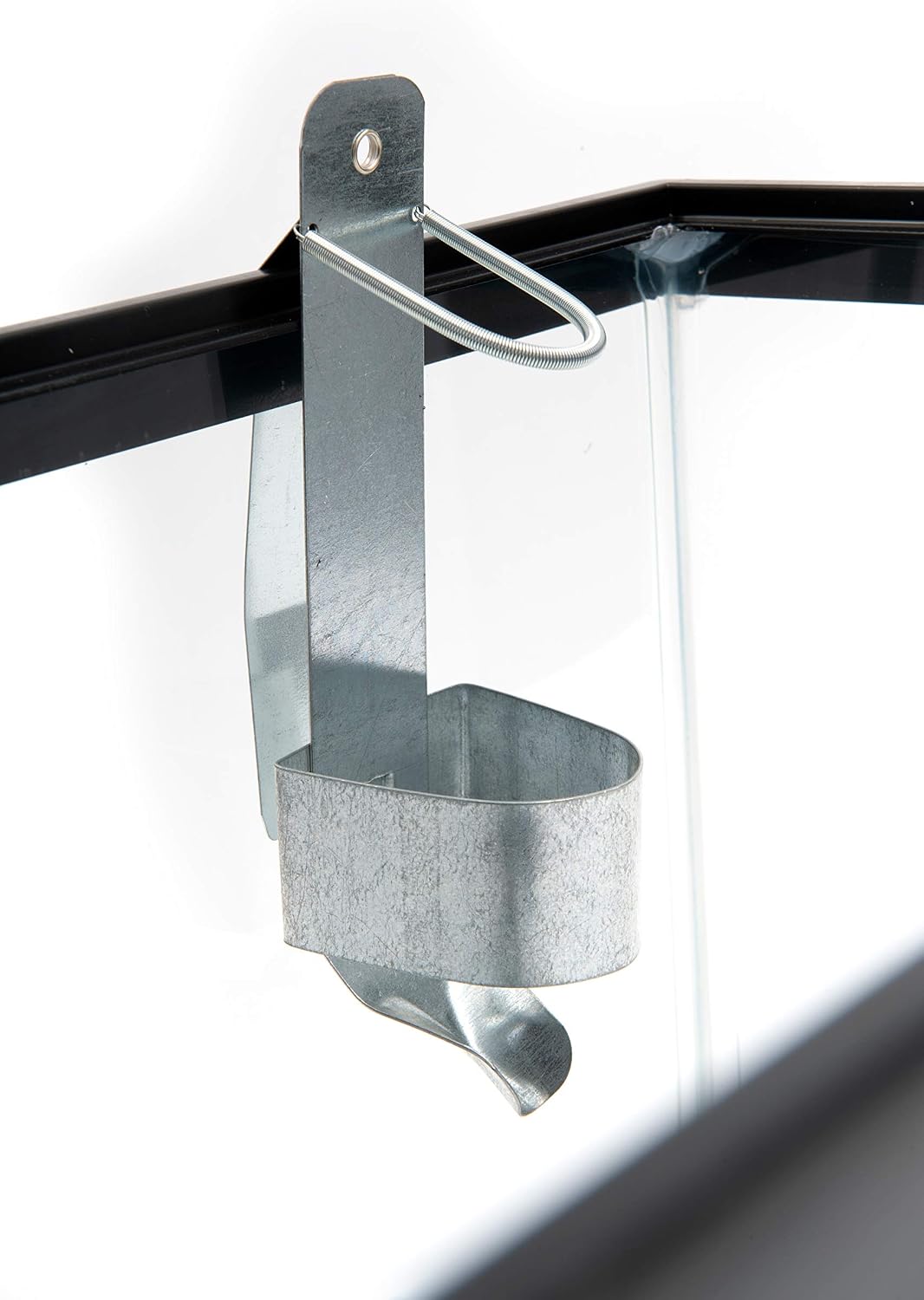 Close up of the nozzle and cap shield on a galvanized steel chew guard.