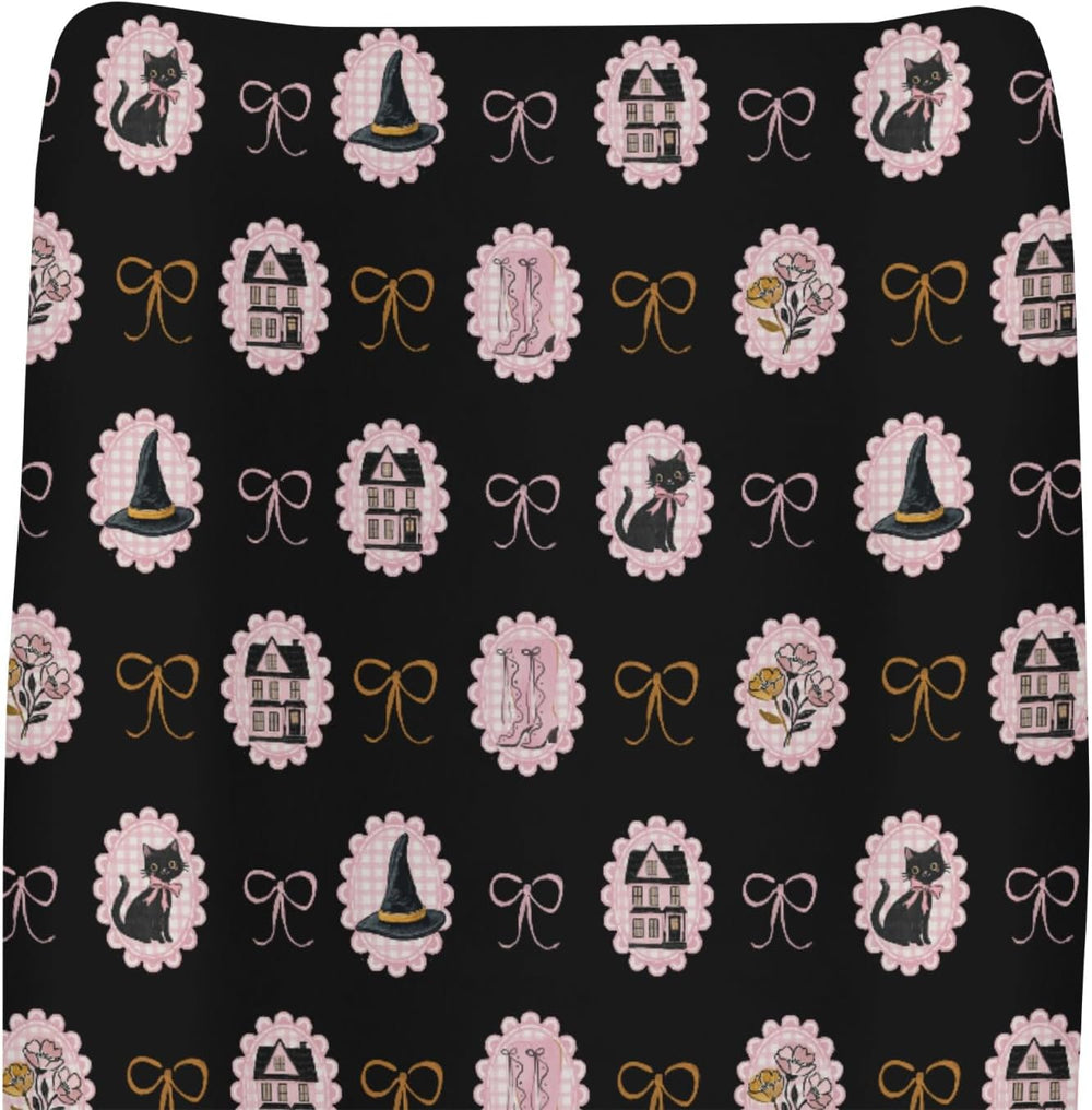ZoUbqchY pink and black Halloween changing pad cover front view showing witch cat design