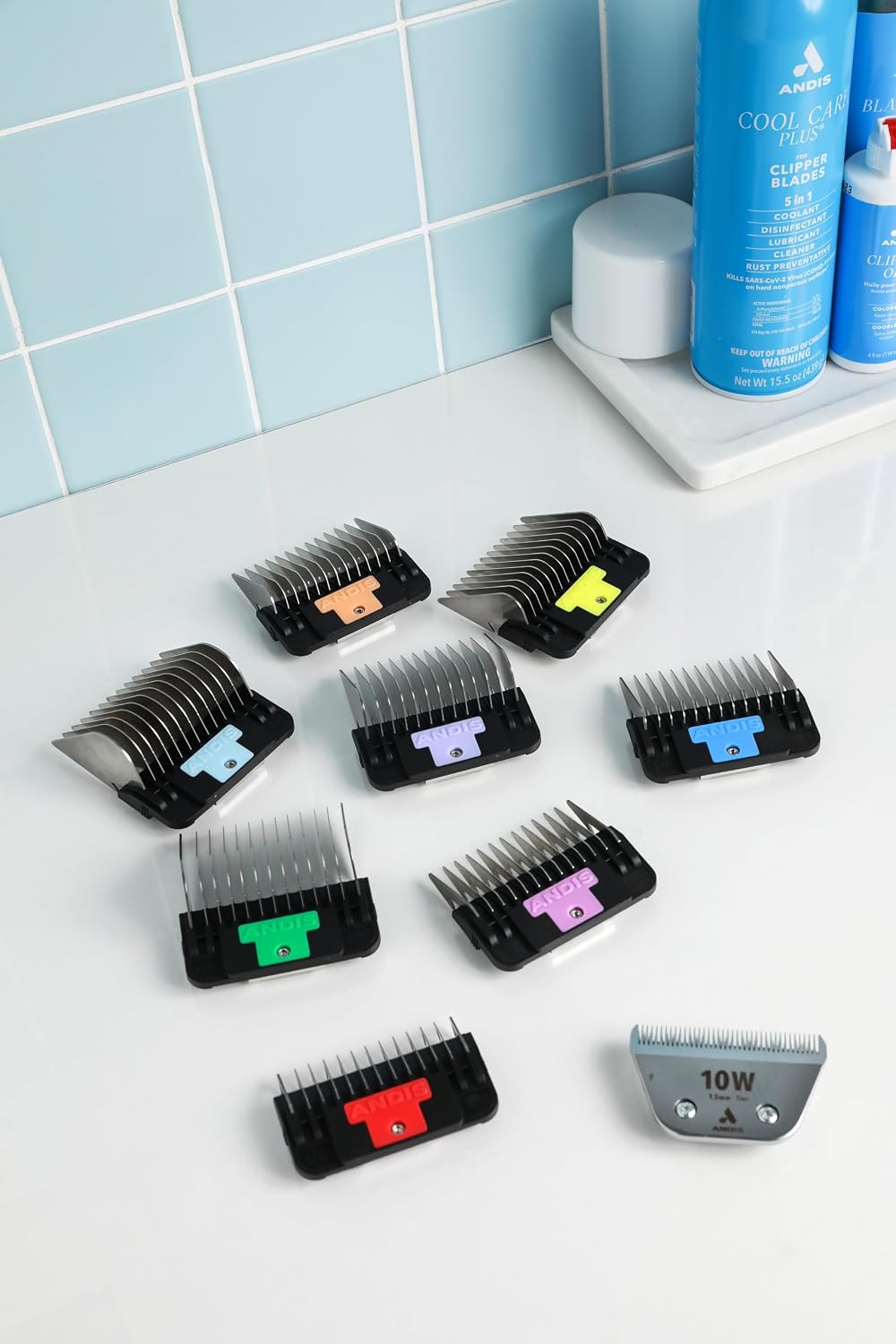 Close up of Andis color coded stainless steel comb teeth