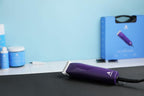 Four attachment combs included in the Andis pet grooming kit.