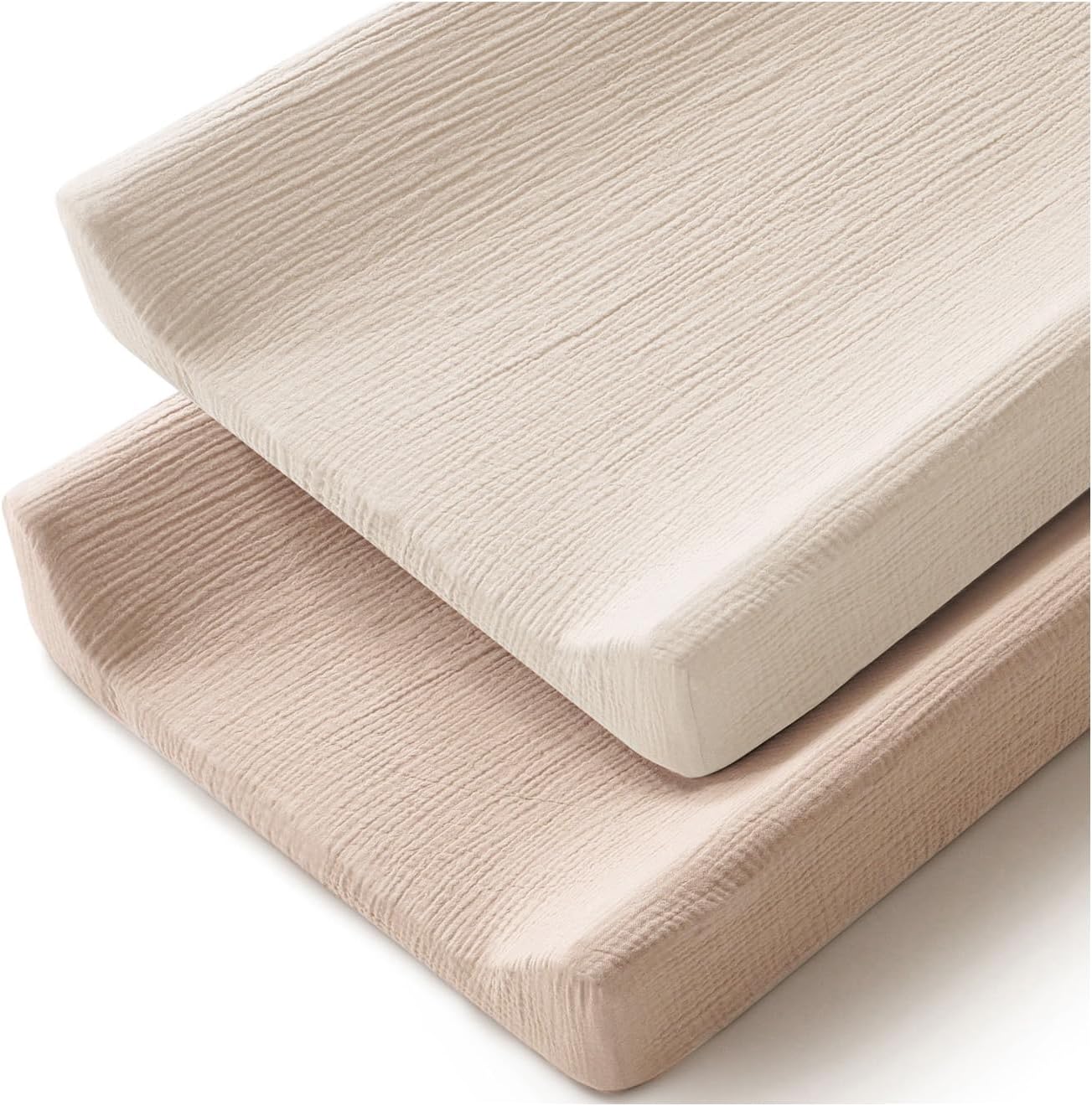 MairMore muslin cotton changing pad covers 2 pack showcasing the textured neutral clay and ivory sheets in a front lifestyle view.