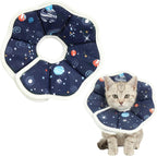 Emutol adjustable soft cat recovery collar front view on a small cat showing the whimsical space themed design.