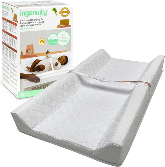 Ingenuity contoured changing pad front view with safety strap