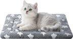 Lightweight washable cat bed mat being placed into a washing machine