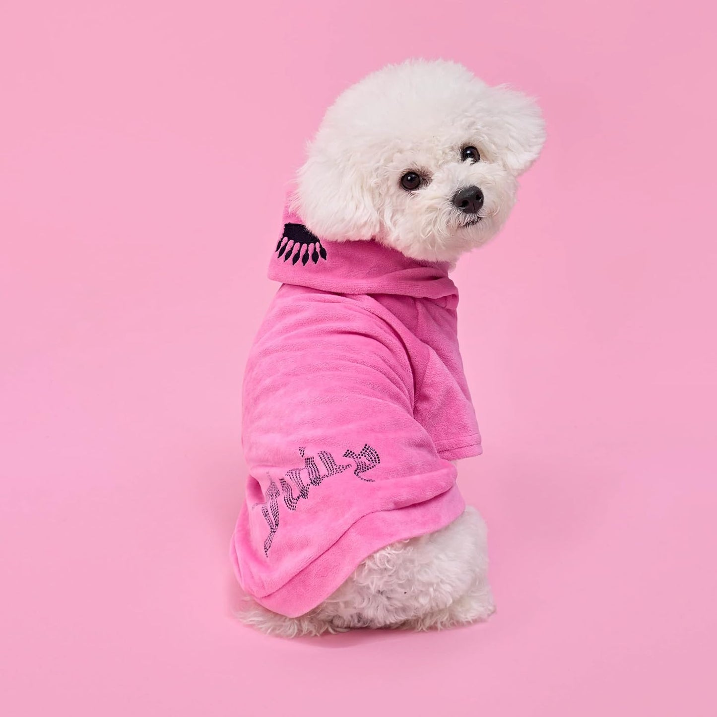 Imported pink velour puppy tracksuit close up fabric texture