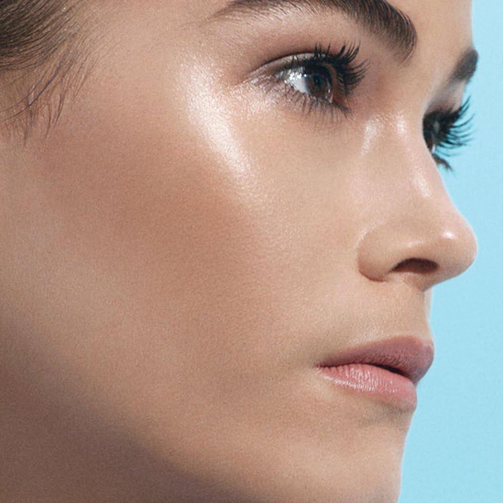 Full coverage liquid foundation cushion container with mirror lid opened.