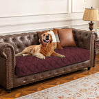 Ameritex waterproof dog bed cover spread over a living room sofa front view