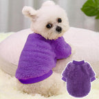 Two pieces of extra extra small pet sweaters laid flat showcasing the vibrant rose and purple colors.
