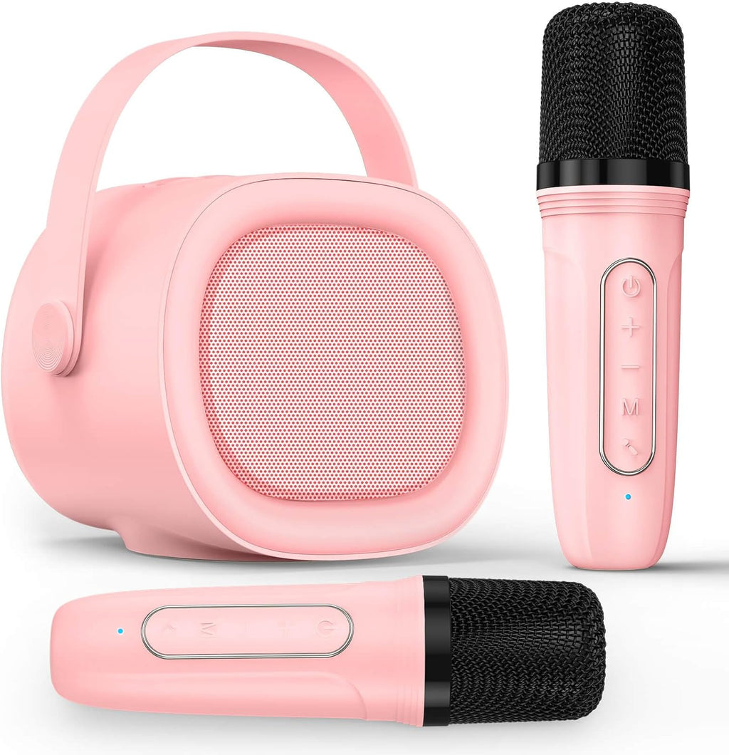 LENRUE karaoke machine for kids front view showing the pink speaker with handle and dual wireless microphones.