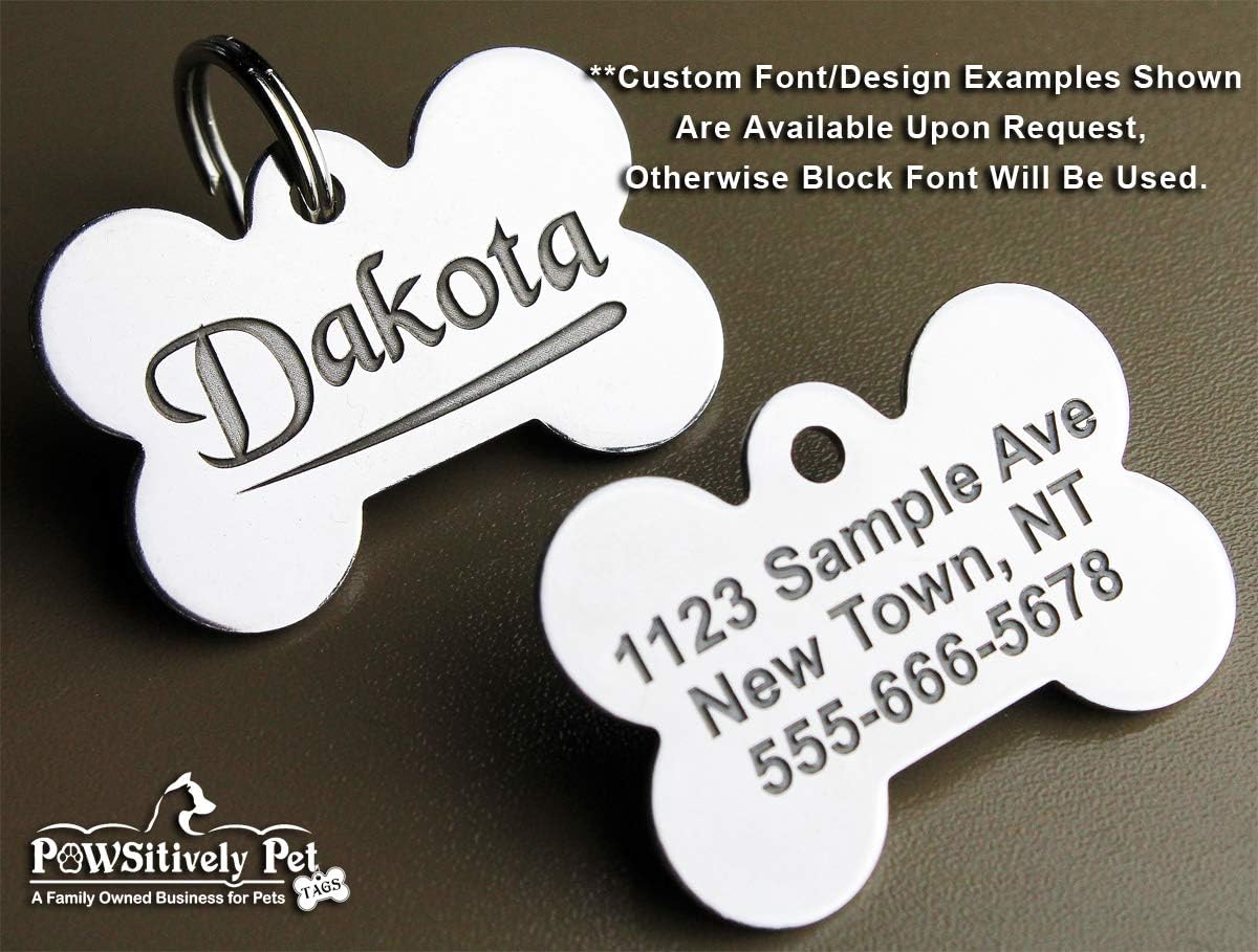 Back view of the Pawsitively Pet Tags bone variant demonstrating clear multi line text layout for emergency phone numbers.