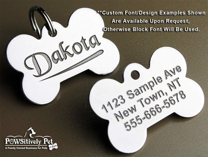 Back view of the Pawsitively Pet Tags bone variant demonstrating clear multi line text layout for emergency phone numbers.