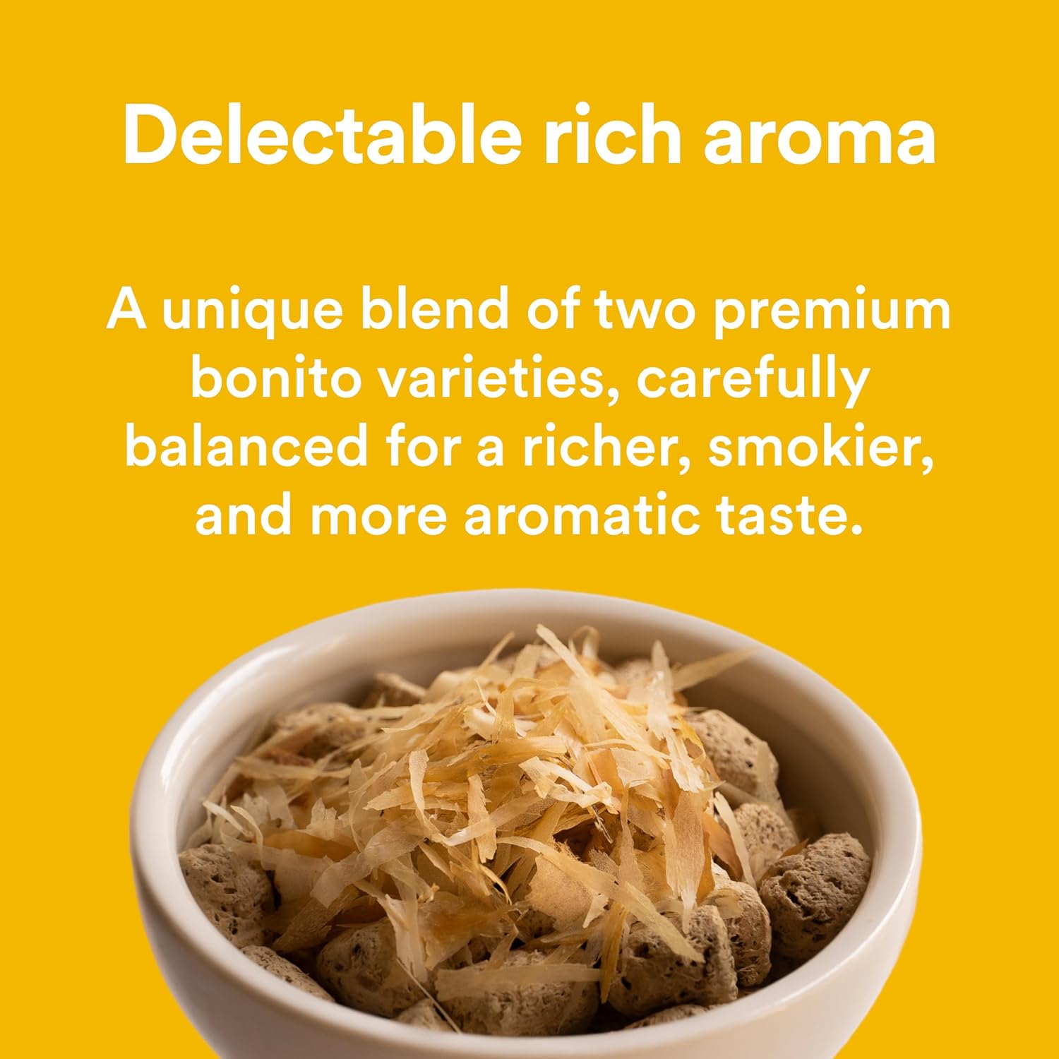 Bonito House flakes being sprinkled on dry pet food