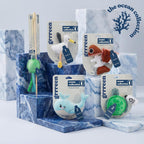 Side view of the GRRREEN teeth cleaning bite resistant fish puzzle plush toy for kittens.