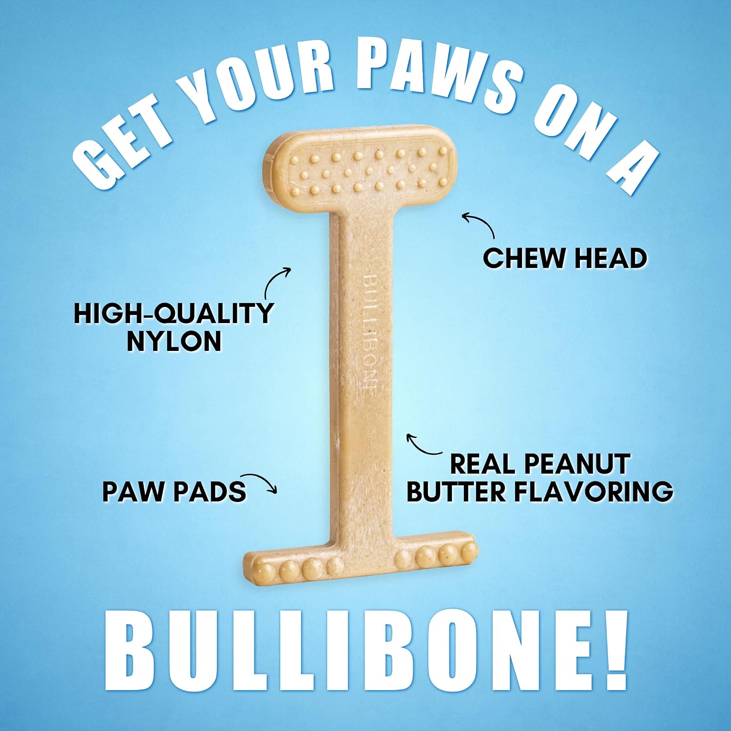 Small dog holding Bullibone toy by the paw-friendly base