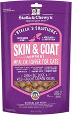 Happy cat eating from a bowl with Stella & Chewy's mixer added