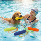 A medium sized dog retrieving the high visibility Skylety foam bumper toy from a swimming pool.