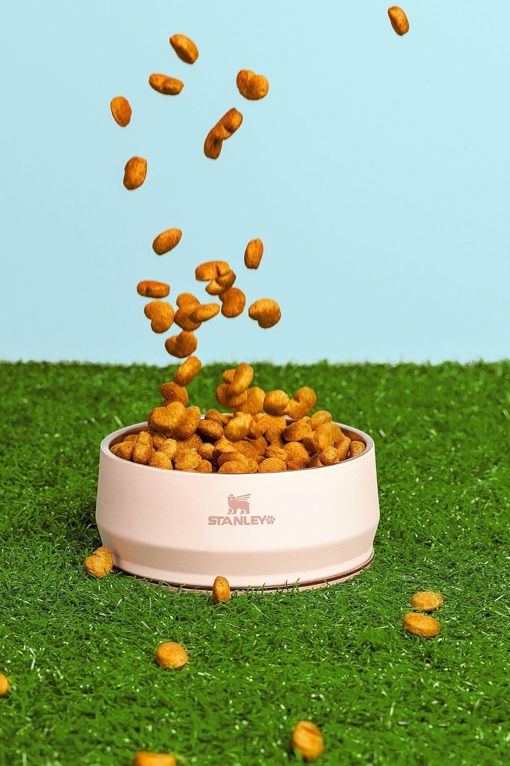 Durable three cup cat and dog feeding bowl with tapered sides.