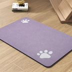Beige pet placemat for messy drinkers with water bowls arranged on top