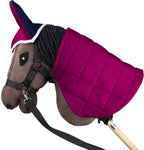 Handmade SKIPPI fleece blanket with adjustable neck closure laid flat.