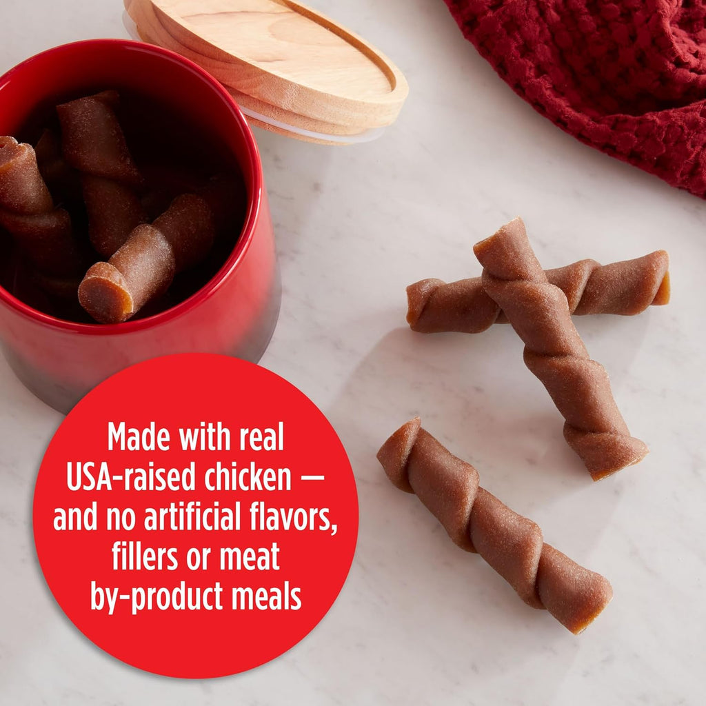 Premium USA imported Milk-Bone flavor rolls dog treats displayed on a clean surface