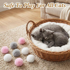 Abeillo premium imported fuzzy cat balls spread out to showcase the complete nine piece pet entertainment kit.