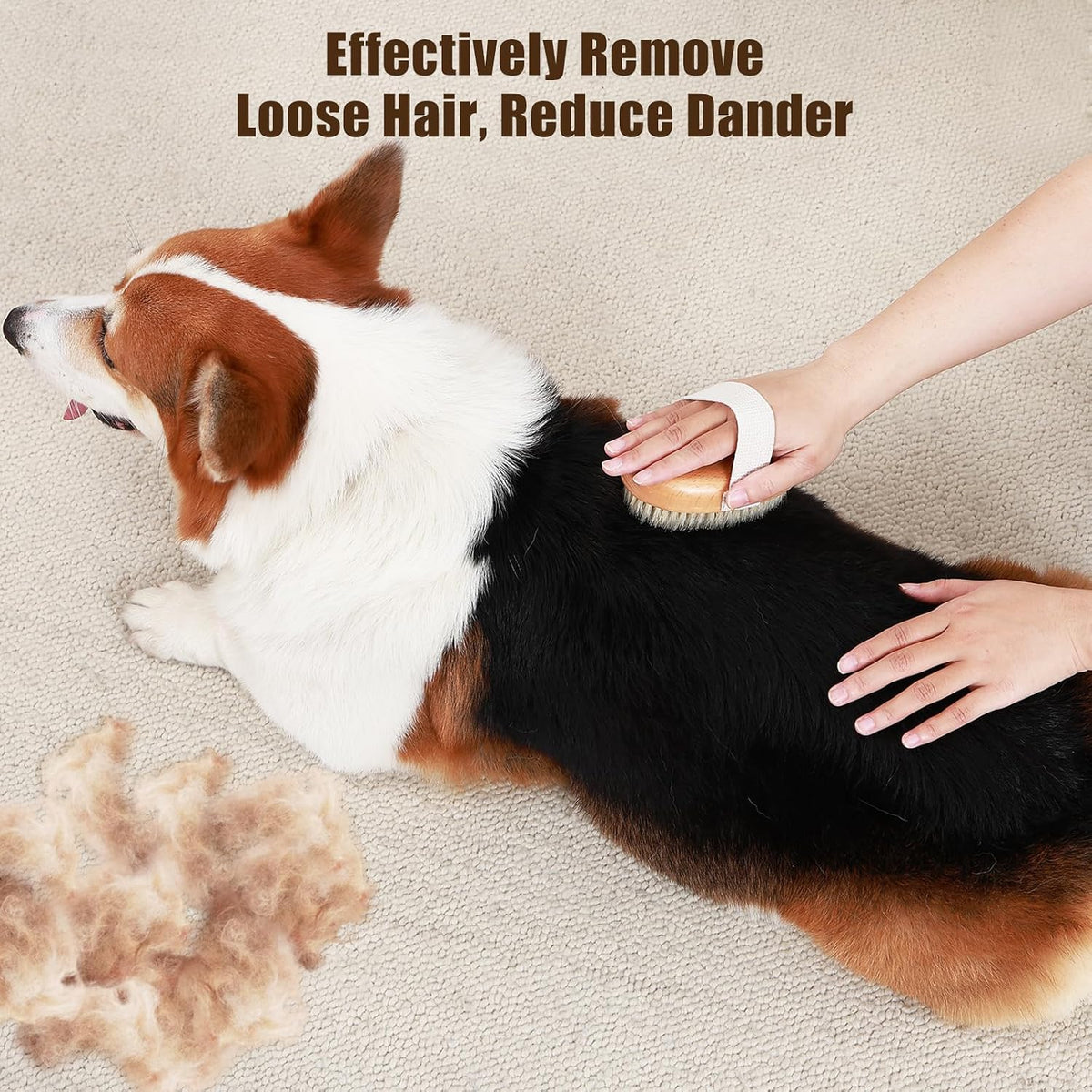 Handheld ergonomic pet brush with cotton band on a beech wood base.