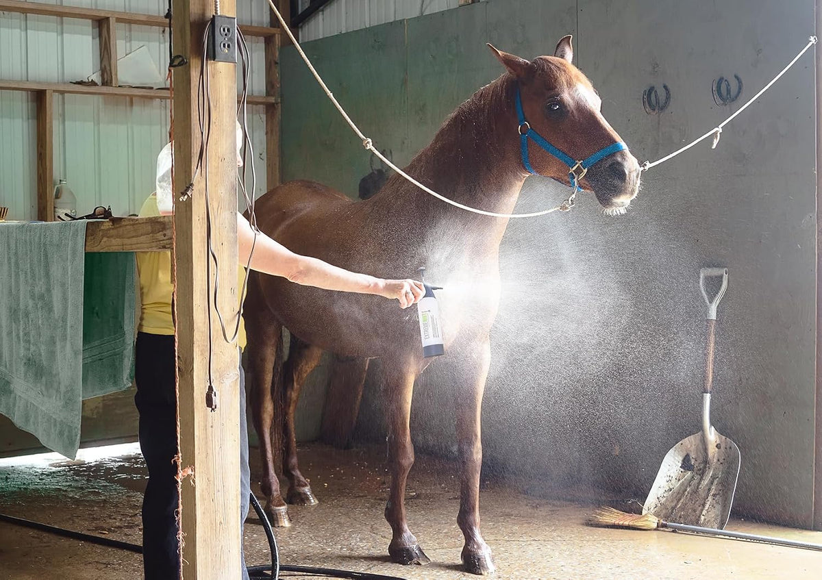 ExtremeMIST portable stable sprayer bottle for horses side angle showing heavy duty pump handle