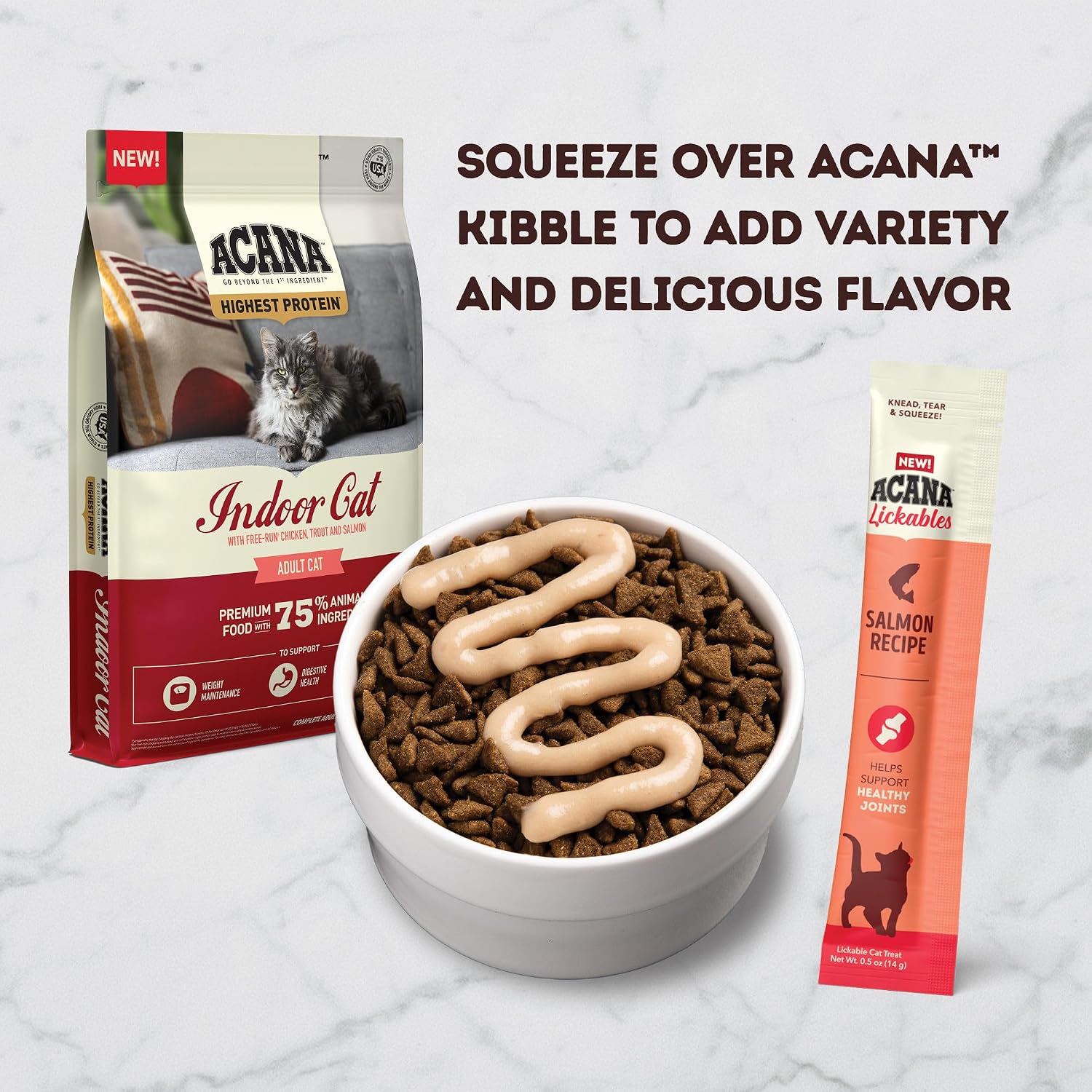 Cat enjoying ACANA Lickables salmon treat from a spoon
