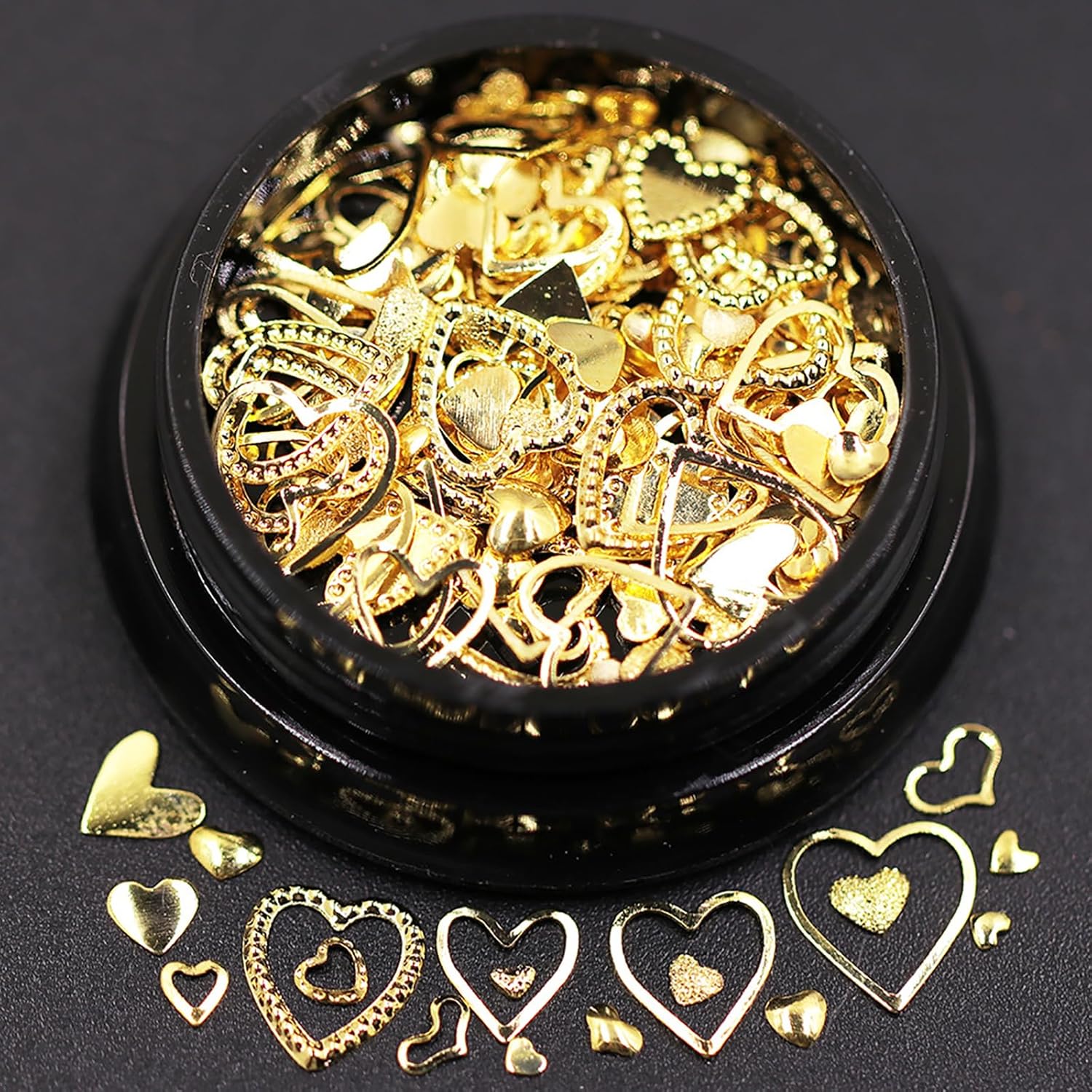 Cynailli HYWWPFLA 3D gold heart nail art charms showing front view pack.