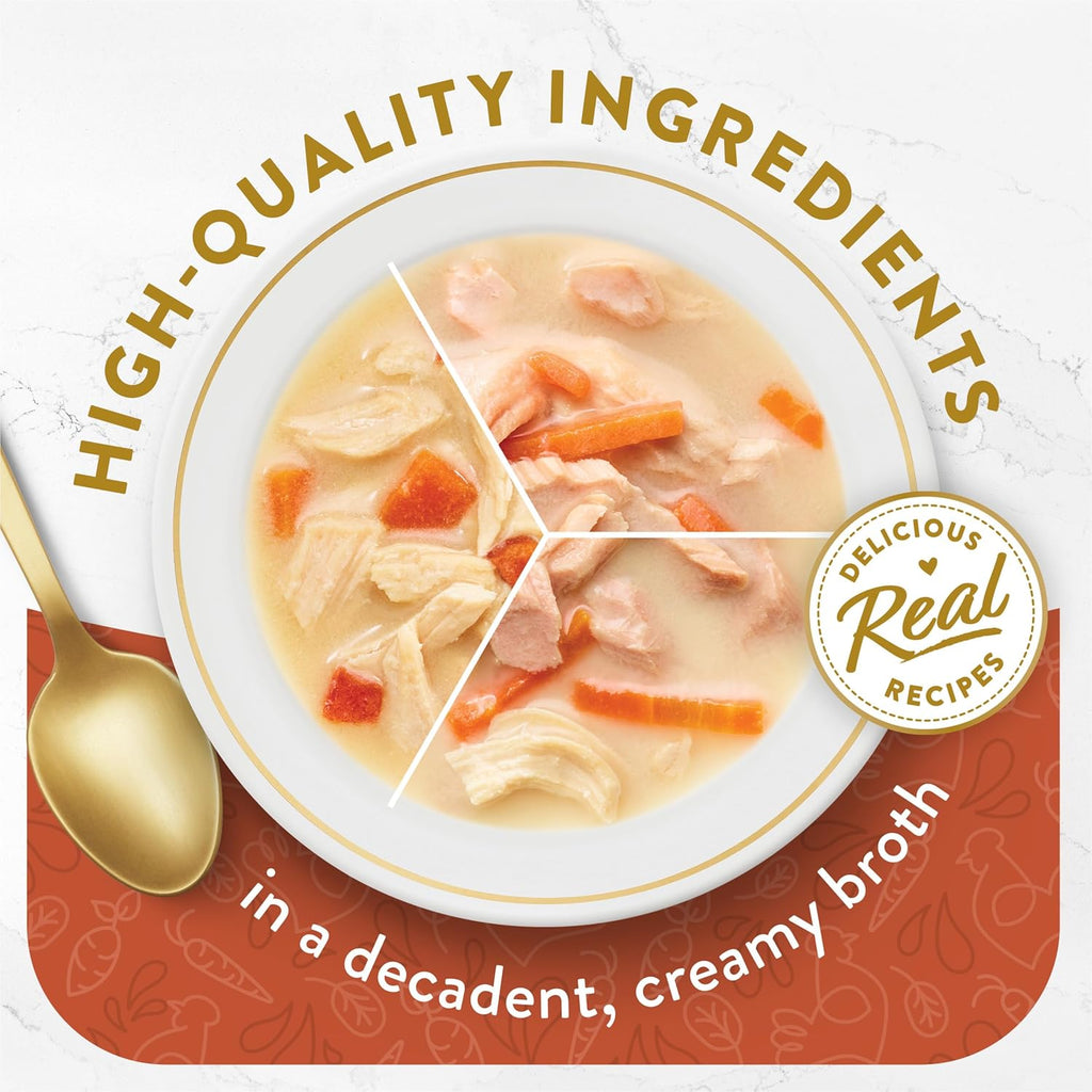 Close up view of creamy broth pouring into a bowl for cats.