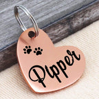 Ultra Joys Custom Dog Tag attached securely to a small puppy collar