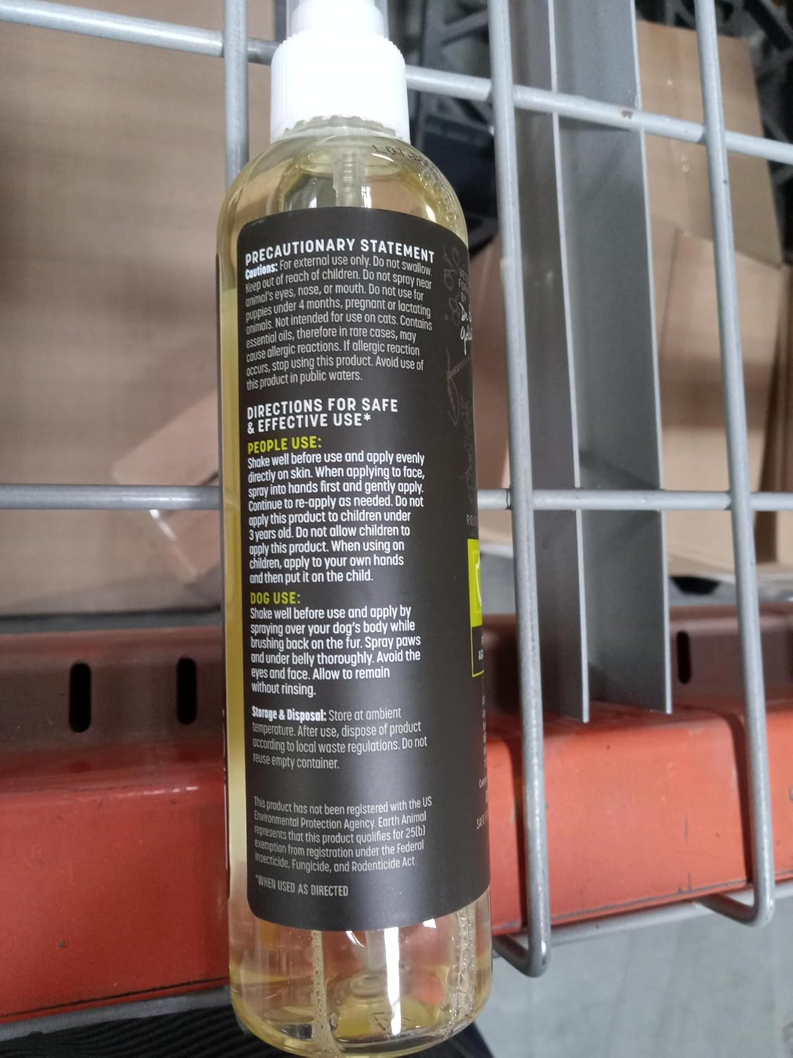 Detailed view of the spray nozzle on the Earth Animal bottle