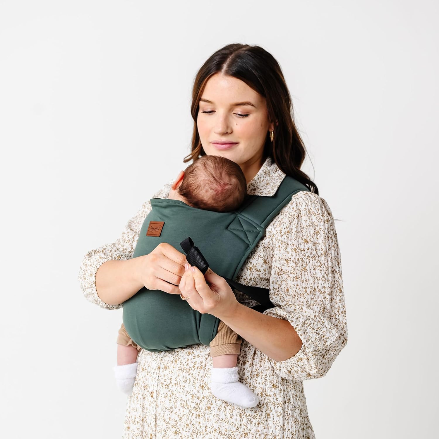 Boba Happy Haven Baby Carrier in sage green front view featuring organic cotton fabric and leather brand patch