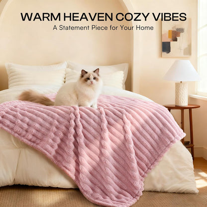 Small puppy resting comfortably wrapped inside the pink flannel pet blanket