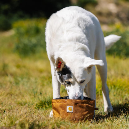 Side view of Carhartt packable travel dog bowl with cinched snap closure