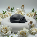 Comemori matte black resin cat cremation urn showing smooth hand-sculpted details