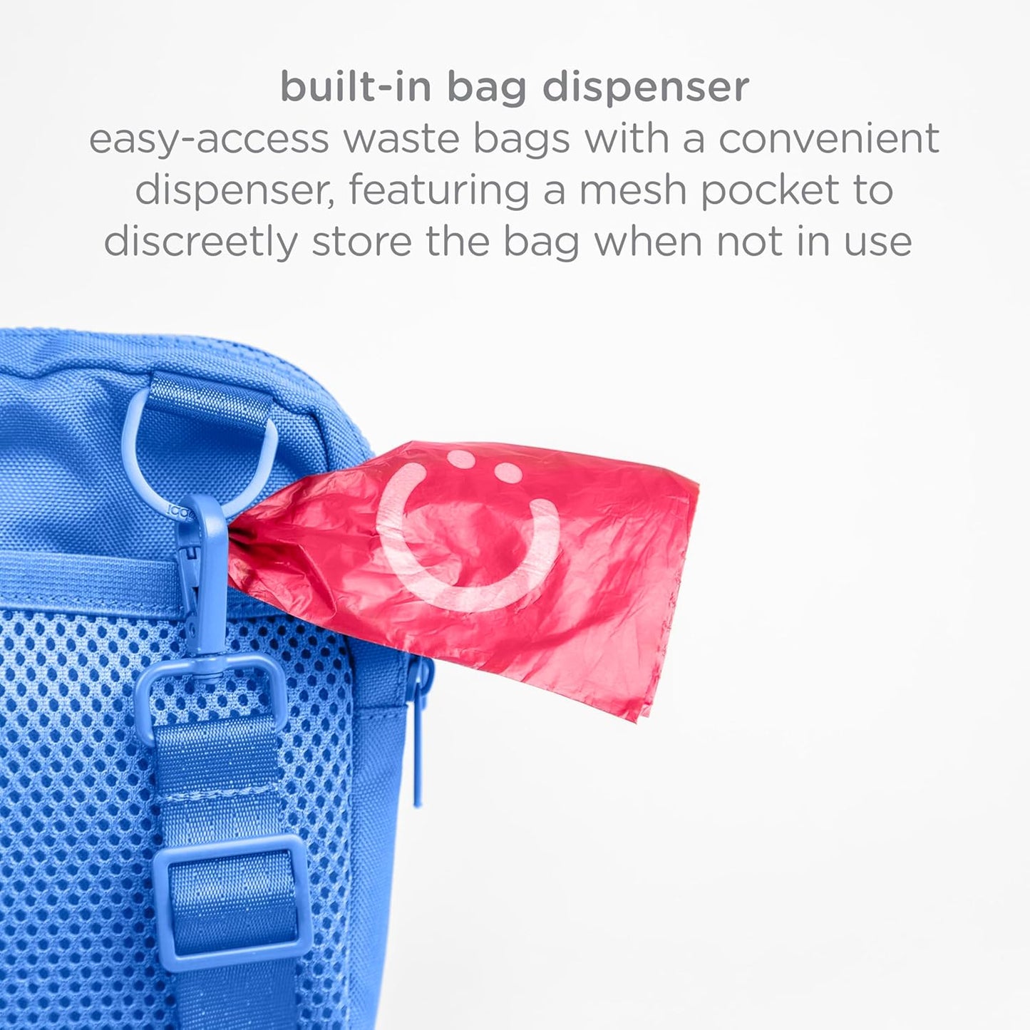 Spacious side zippered pocket of the Ubbi pet utility pouch holding a phone and keys