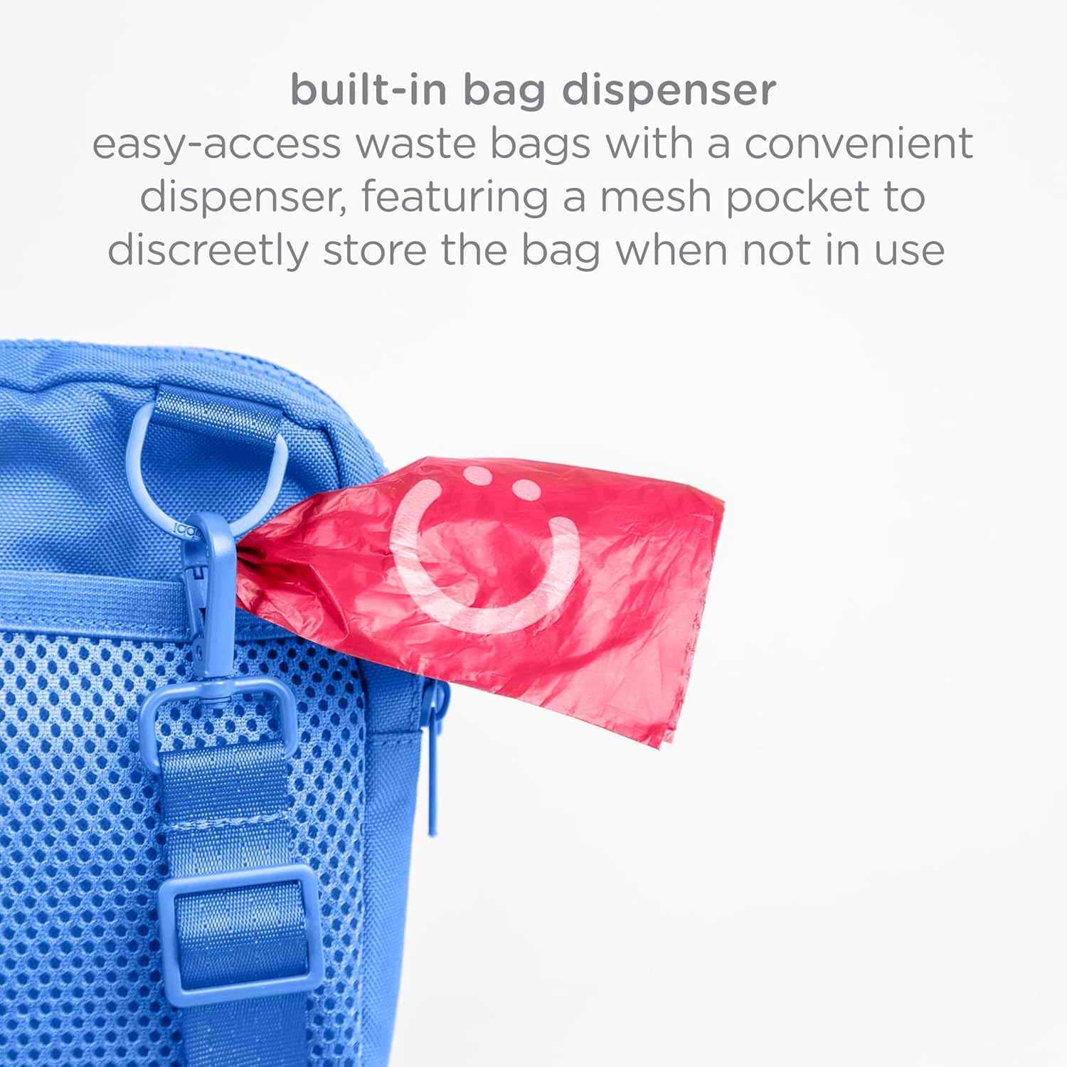 Spacious side zippered pocket of the Ubbi pet utility pouch holding a phone and keys