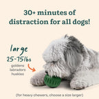 Dog enjoying the Woof Pupsicle long-lasting interactive treat toy