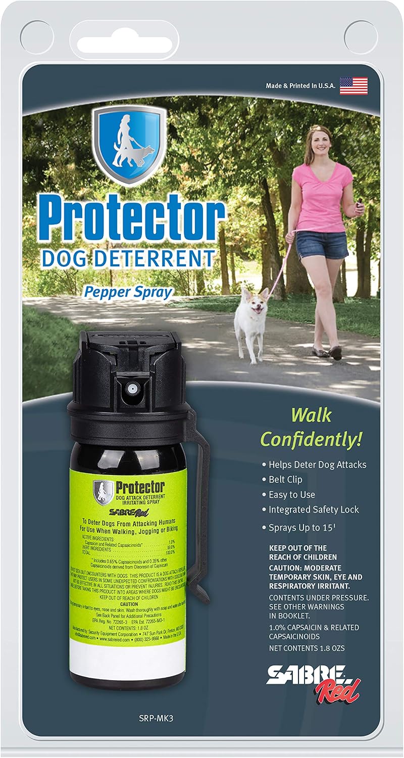 Detailed view of the Sabre dog spray safety nozzle and clip