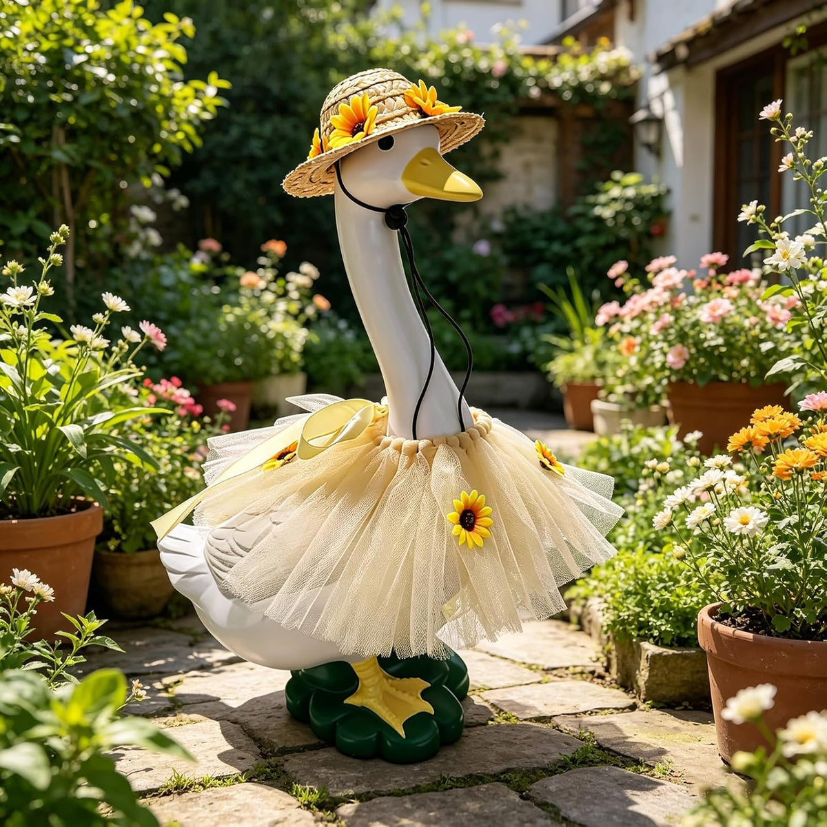 Farmhouse patio lawn sculpture dressed in yellow flower clothes.