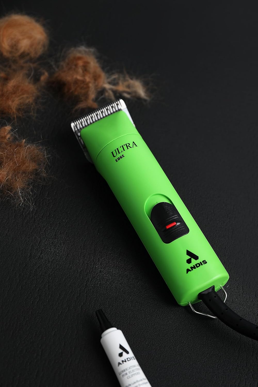Andis dual speed rotary motor pet grooming clipper with long heavy duty power cord.