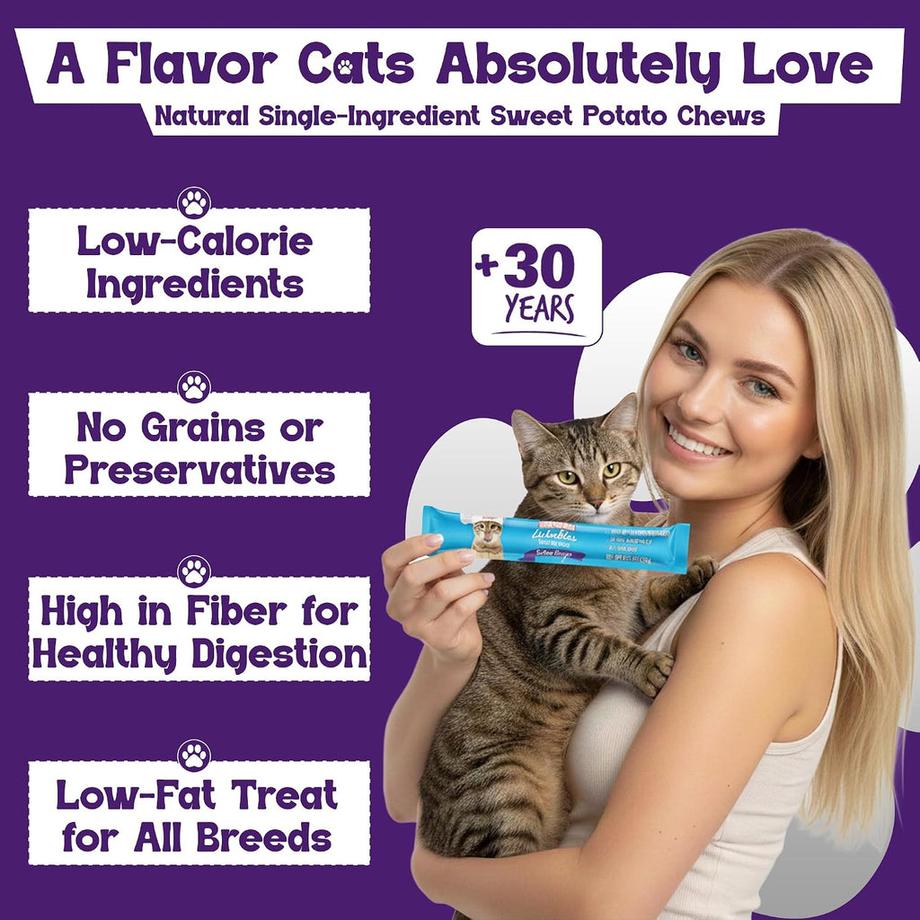 Cat enjoying Beefeaters puree treat from a squeeze tube