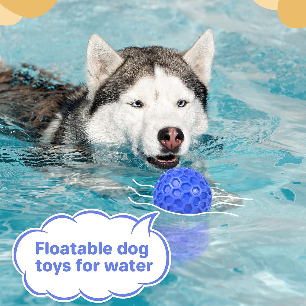 Non toxic natural rubber blue dog ball by DISSKNIC shown from an angle.