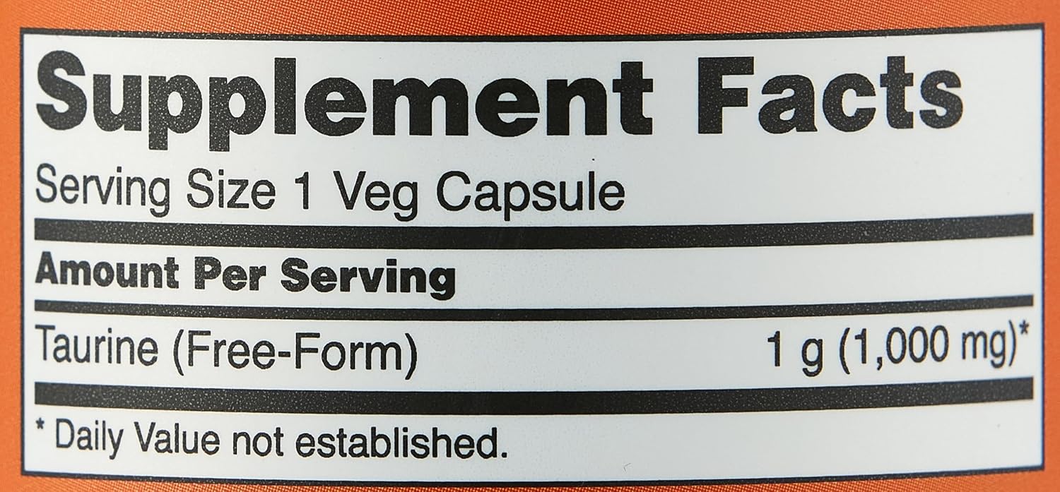 Imported NOW Foods Double Strength Taurine amino acid capsules showing non-GMO and vegetarian product seals.