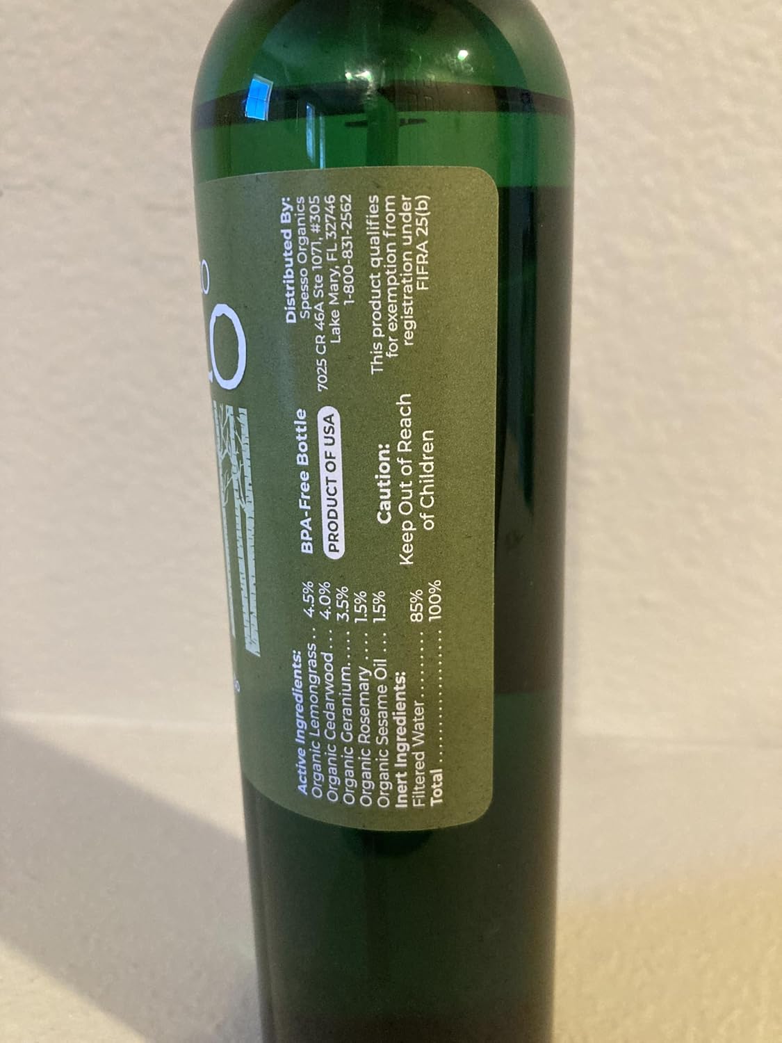 Spesso Organics Repello bottle on a clean background for pet care
