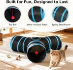 Cat playing inside the interactive Tempcore tunnel with the teaser wand.